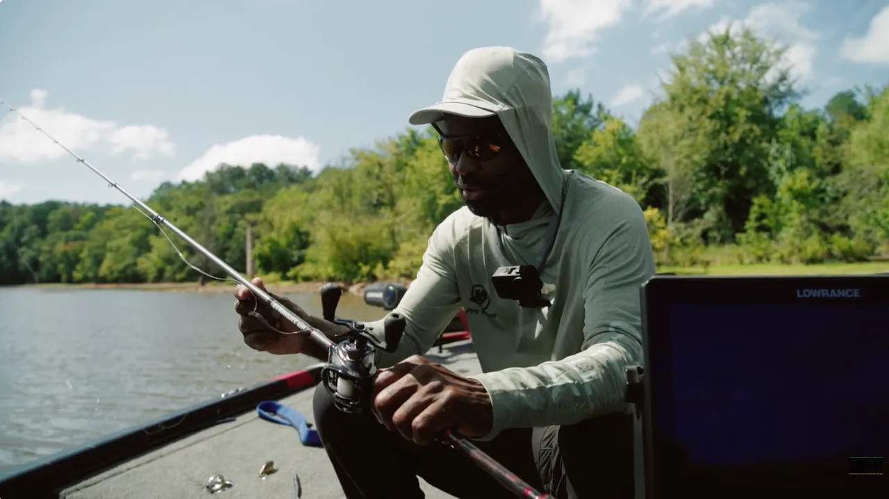 Brian Latimer of Straight Up Fishing holding a handmade BardeRodz rod